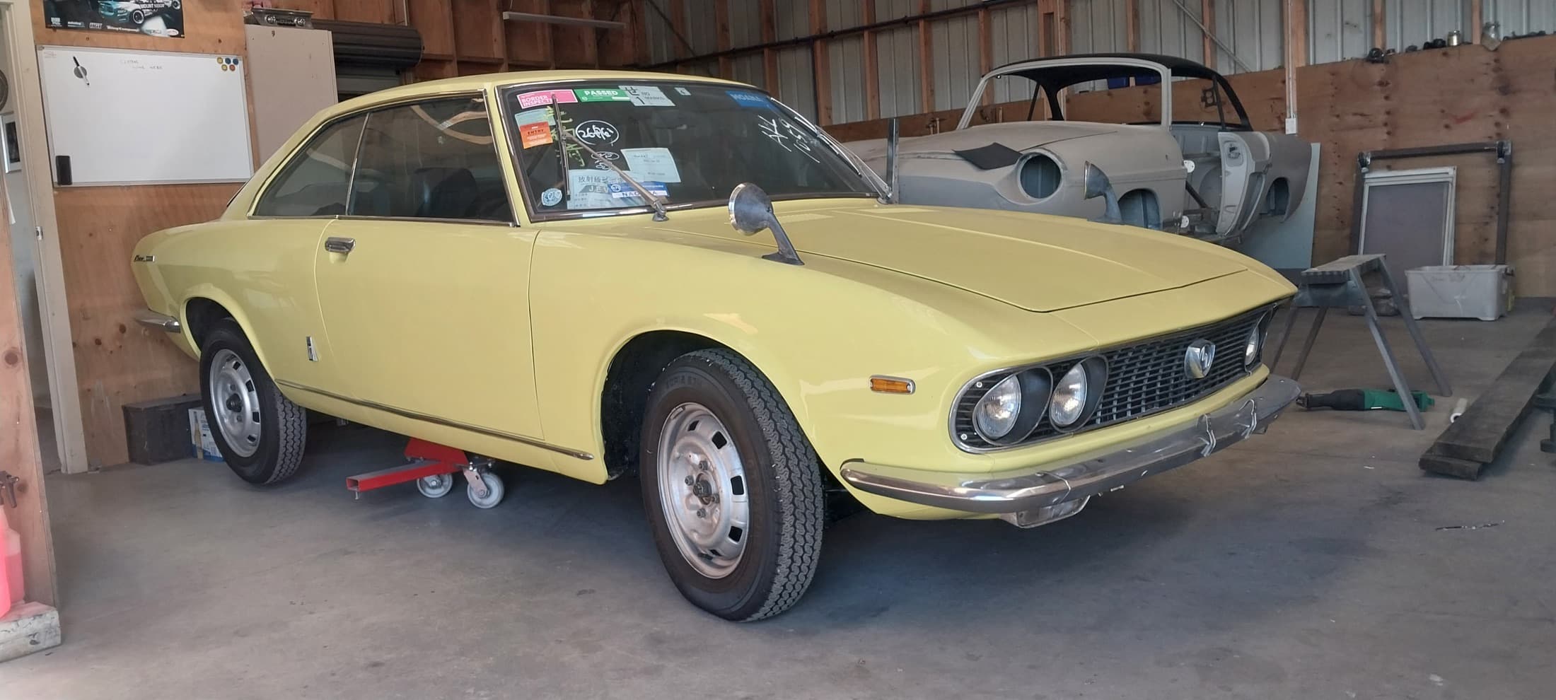 Classic Mazda Luce in the Panel Beating Services workshop