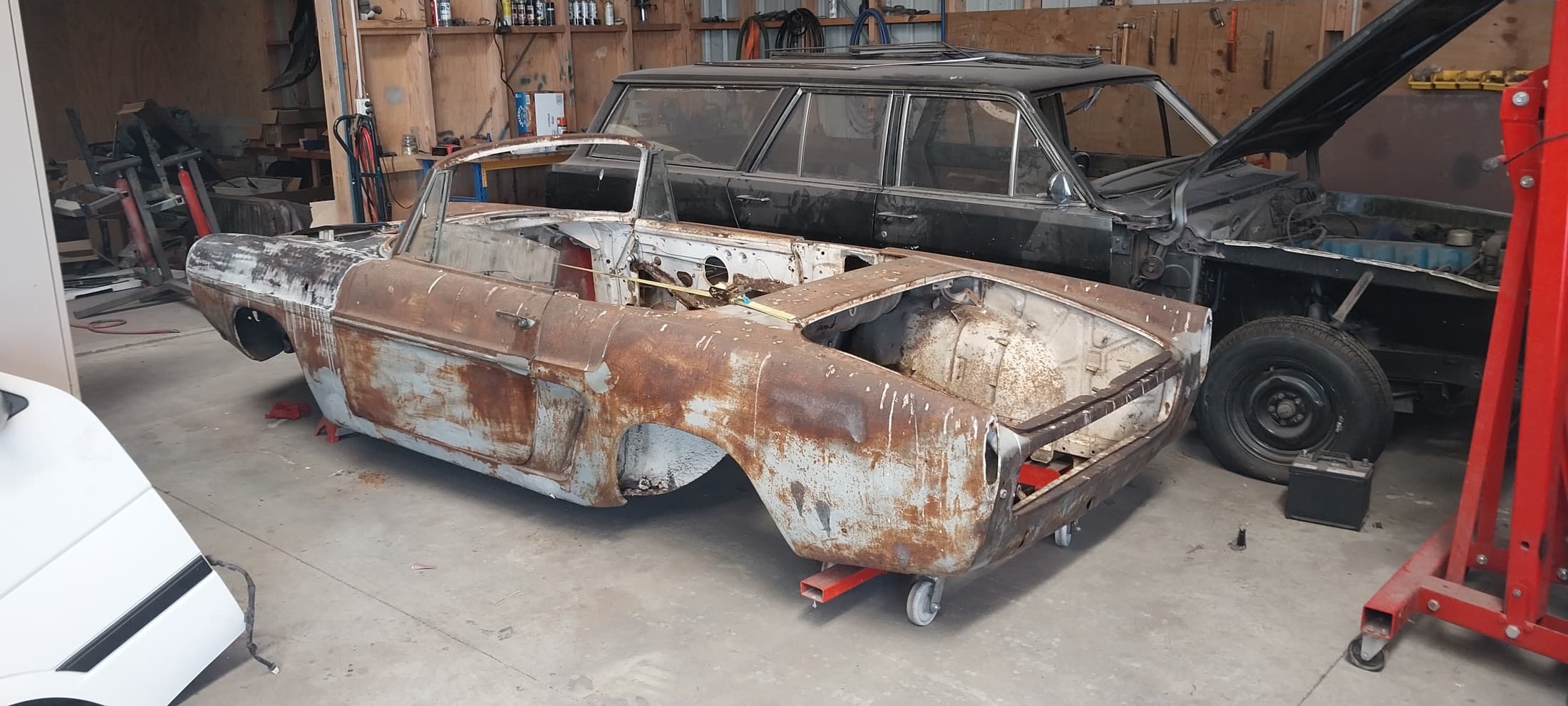 Bare shell, Stripped back for rust repair, by Panel Beating Services